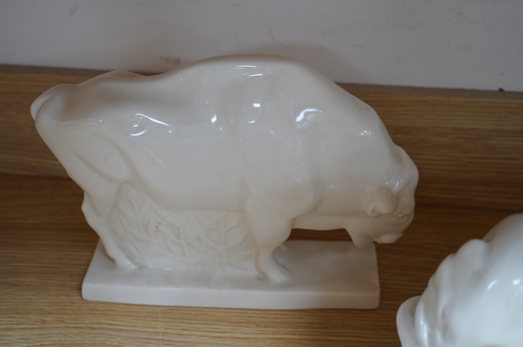 John Skeaping for Wedgwood, six animal figures comprising a Bison, Tiger, Polar Bear, deer, monkey and deer, largest 34cm wide